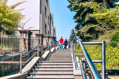 Tourists walk on the stairs in Gorlice, Poland.