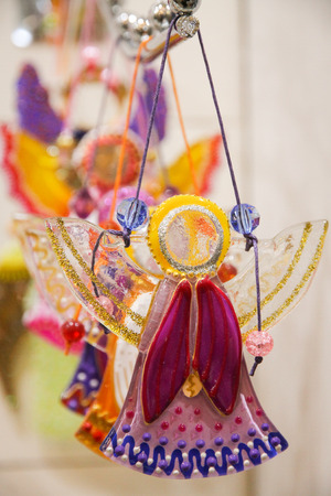 beautiful glass angel made in the technique of fusingの写真素材