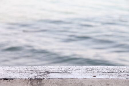Nature marine background with a wooden deck, the sea.