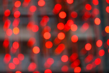 Background with red city lights. Blurred picture.の写真素材