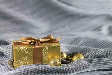 Christmas background with gift and christmas decorations. Festive mood.