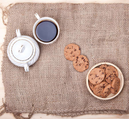 Chocolate chips cookies on the rustic hessian background, top viewの写真素材