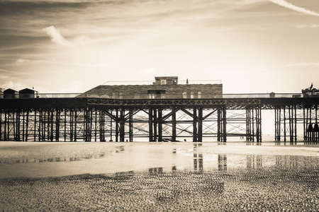 The silhouette of the new Hastings pier which was rebuilt and open to public in 2016, photo against the sun, special effect filter applied, East Sussex. Englandの写真素材