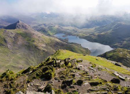 Track in Snowdonia National Park, North Wales, United Kingdom; view of the mountains and the lakes, selective focusの写真素材