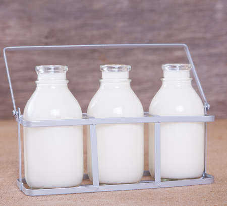 Three bottles of milkの写真素材