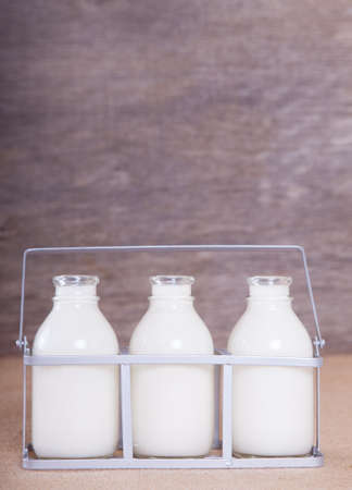 Three bottles of milkの写真素材
