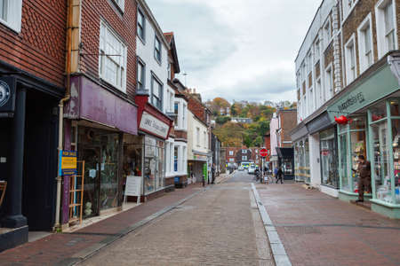 LEWES, ENGLAND - 6 November 2018: Hillside landscape of Lewes town, shops and houses at shopping street, East Sussex, England, UKのeditorial素材