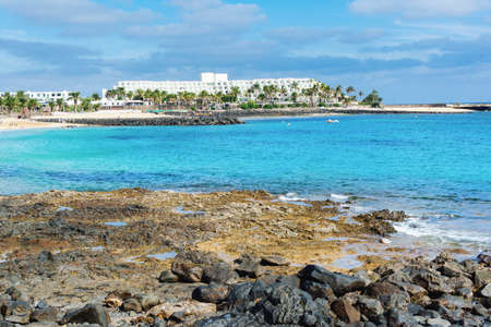 View of Playa de las Cucharas beach in Costa Teguise, Lanzarote, Spain, turquoise waters, selective focusの写真素材