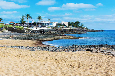 View of Playa Bastian beach in Costa Teguise, Lanzarote, Spain, clear turquoise waters, selective focusの写真素材