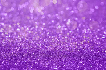 Abstract composition. Purple glitter light background with beautiful bokehの写真素材