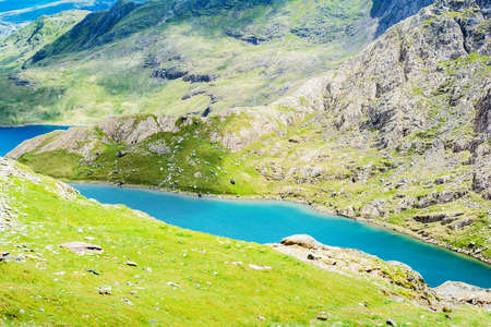 View of beautiful lakes in North Wales, mountains on the back, selective focus