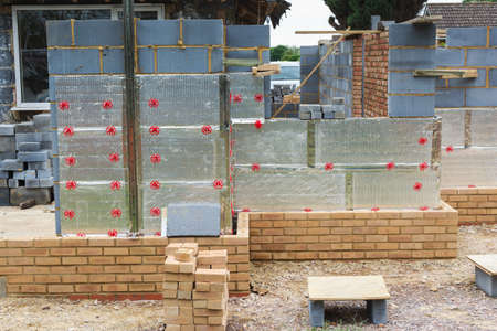 Renovation projects. Building of extension of the existing house, insulated brick walls, selective...