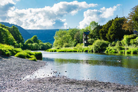 Llanwrst, small market town in North Wales, United Kingdom, view of the buildings overlooking river Conwy, selective focusの写真素材