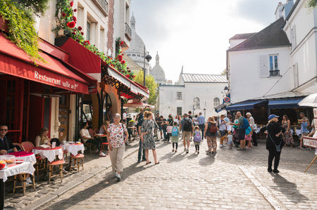 Paris, France - August 26 2022: People, artists, shops in Mormartre village, famous for its artistic heritageのeditorial素材