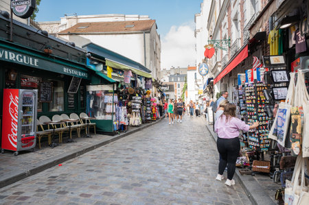 Paris, France - August 26 2022: People, artists, shops in Mormartre village, famous for its artistic heritageのeditorial素材