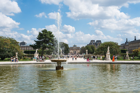 Paris, France - August 26 2022: Fouintains in Tuileries gardens near Arc de Triomphe du Carrousel, meaning triumphal arch located in Place Carrouselのeditorial素材