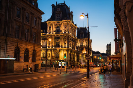 Paris, France - August 27 2022: Paris Tourism Office is in the north wing of the Hotel de Ville - City Hall located in famous le Marais district, Paris, France. Night scene, lit up buildingのeditorial素材