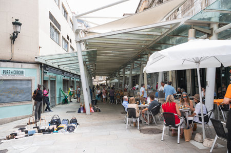 Vigo, Spain - July 5 2023: Buildings in Vigo city Centre, the biggest city in Galicia Region, in the North of Spain, selective focusのeditorial素材