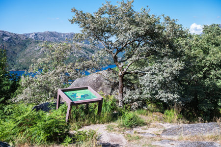 Sign near view point in Peneda Geres National Park, North Portugal, view of the mountains, rivers and trees, selective focusの写真素材
