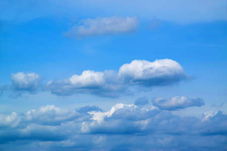 Blue sky with clouds backgroundの写真素材