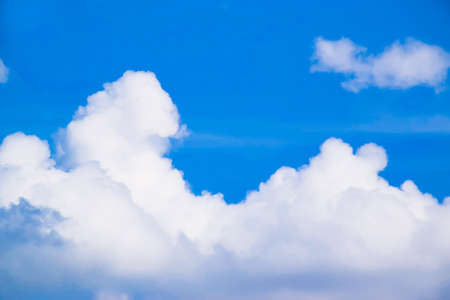 Blue sky white clouds backgroundの写真素材
