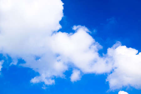 Blue sky white clouds backgroundの写真素材