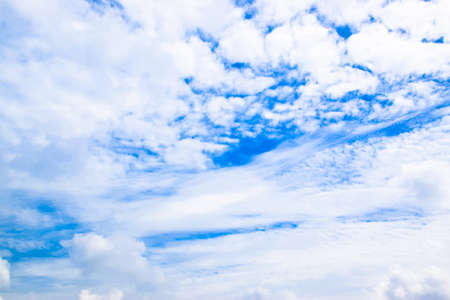 Blue sky with white clouds backgroundの写真素材