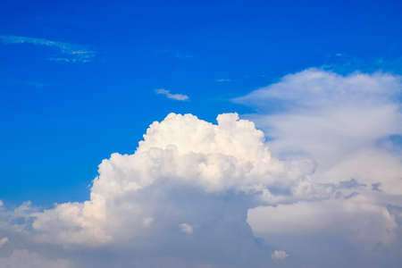 Blue sky with clouds backgroundの写真素材