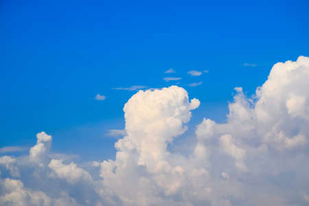 Blue sky and clouds backgroundの写真素材
