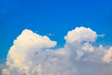 Blue sky with clouds backgroundの写真素材
