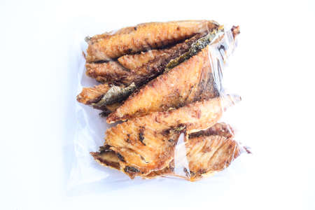 Fried Mackerel in package on white Background