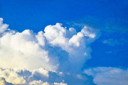 Blue sky white clouds backgroundの写真素材