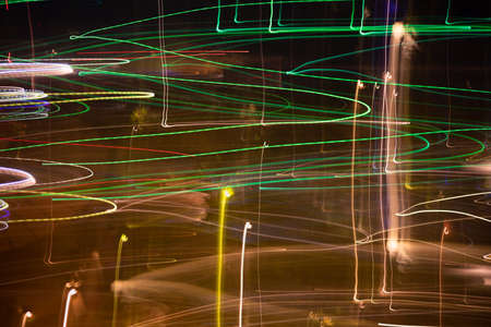 Photos of light and color in the city during the night caused by camera movement(out of focus)