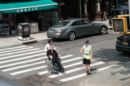 City crosswalk with pedestrians