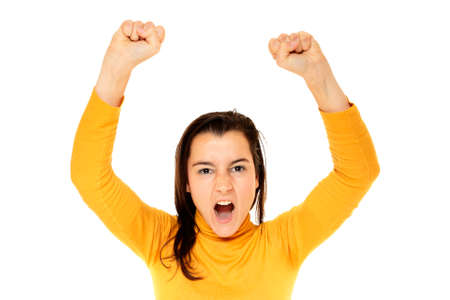 Close-up of a young woman raising her arms with white backgroundの写真素材