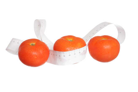 Three red tomatoes with meter isolated on white background