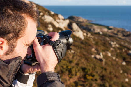 Young photographer in the countryside