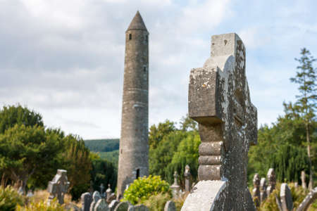 The Old Cemetery. The round tower that stands in St. Kevin's Graveyard in Glendalough, County Wicklow, Ireland.の写真素材