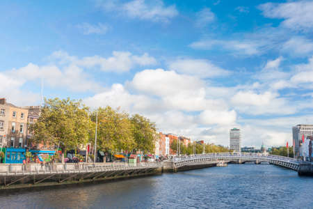 View of Hapenny Bridge over Liffey river in Dublin, Ireland