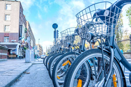 Dublin, Ireland - Oct 25, 2014: Dublin bikes parked on Nassay street in Dublin, Ireland on October 25, 2014のeditorial素材
