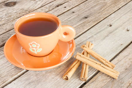 Close-up of a cup of red tea with cinnamonの写真素材