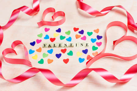 Valentine background written with hearts and ribbonの写真素材