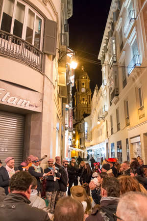 Malaga, Spain - Feb 08, 2015: Murga singing on the street in the carnival parade in Malaga, Spain on February 08, 2015のeditorial素材