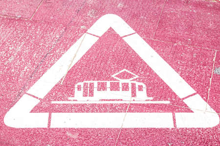 Caution metro sign on a red floor