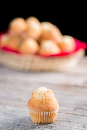 Closeup of a cupcake with an amount at backgroundの写真素材