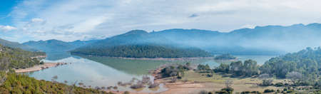 View at foggy lake of tranco in Andalusia, Spainの写真素材