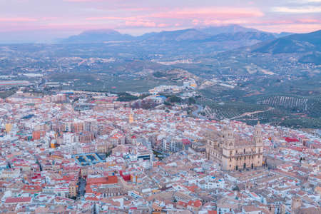 aerial view of Assumption of the virgin Cathedral with sunset at background in Jaen, Andalusia, Spainの写真素材