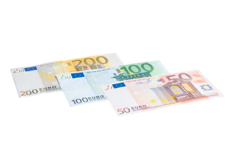 Closeup of different value euro banknote collection isolated on white backgroundの写真素材