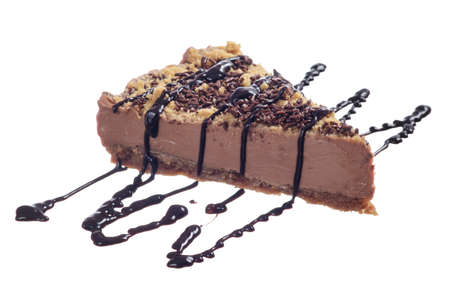 Chocolate cake slice with syrup without plate isolated on white backgroundの写真素材