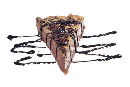 Chocolate cake slice with syrup without plate isolated on white backgroundの写真素材